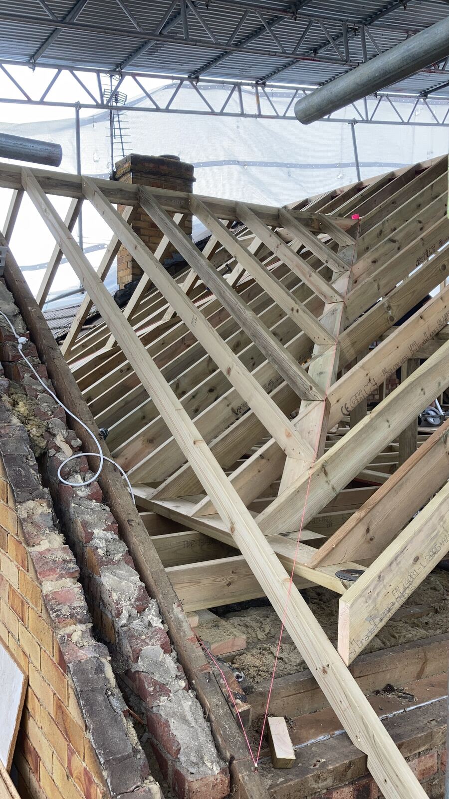 Roof carpentry framing viewed from below